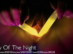 Witness this hot platinum-blonde slam glowsticks in her vagina and ass