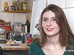 A woman from Munich is visiting Berlin and milking