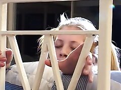 Insatiable ash-blonde teenager glides ginormous fake penis up her taut cunny