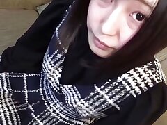 A serious Chinese cutie with brief black hair is ejaculated in her facehole uncensored