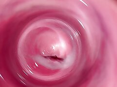 Camera deep inwards Mia's  pearly vagina