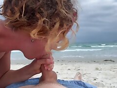 Deep blowjob on the beach, girl in bathing suit throating cock, cum mouth outdoors