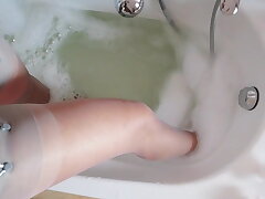 the slave slut of dark-hued cocks, takes a bathtub in stockings2