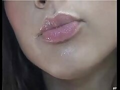 Sucking a fake penis