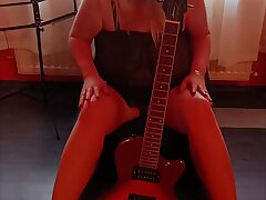 Udders Next to the Guitar